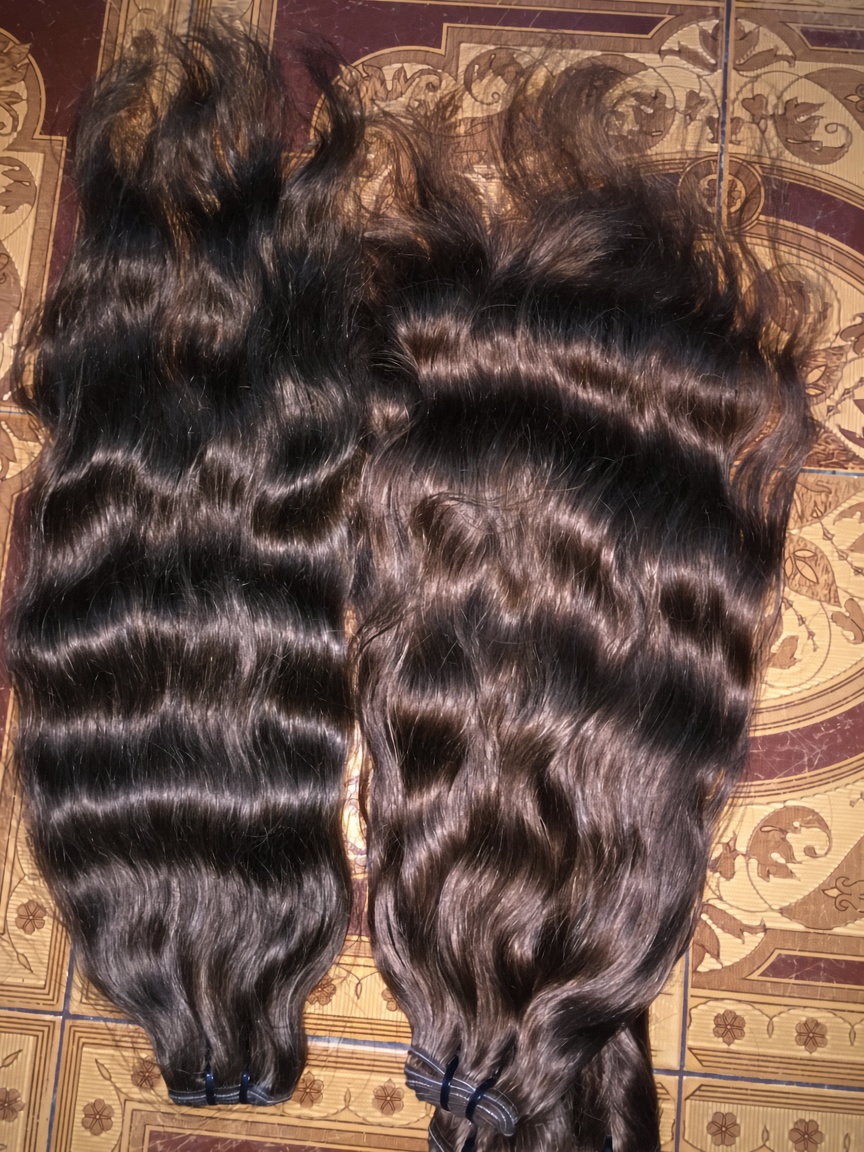 Long natural wavy hair, back view